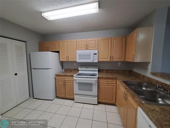 Photo - 11205 W Atlantic Blvd Condo Unit K306