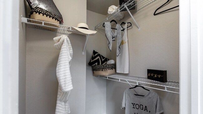 Unwind in tranquil bedrooms boasting spacious closets tailored for your storage needs.