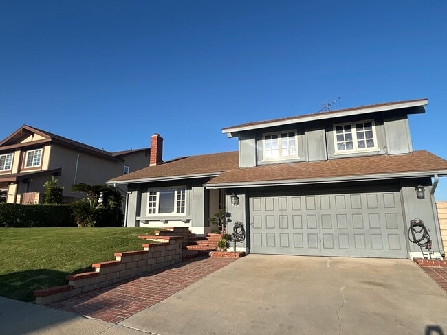 Building Photo - Rare opportunity to lease a 4-bedroom home featuring oversized bedrooms, scenic hilltop city view...