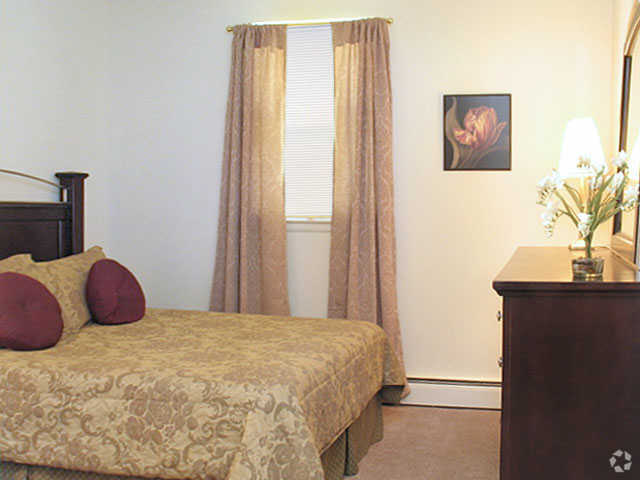 First Bedroom - Mayflower Crossing Apartments