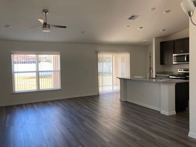 Photo - Like new 3/2/2 with screened in porch! Located close to the beach, shopping, parks and so much mo...