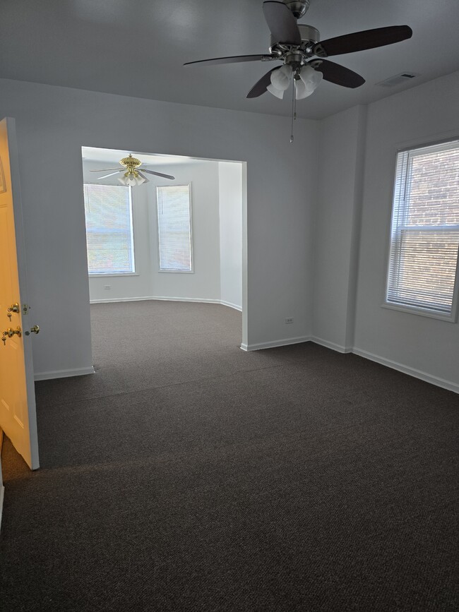 well lit living rm & dining room new carpet - 55 Chicago Ave Unit 2
