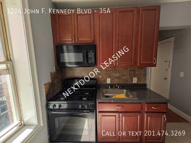 Building Photo - 1204 John F. Kennedy Blvd Unit 35A