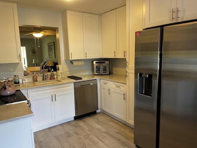 6936 Huntington Ln Unit 103