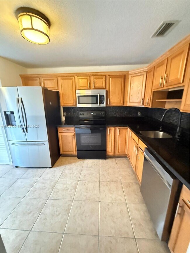 Photo - 9986 Royal Palm Blvd