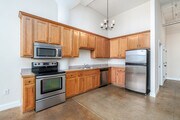 1BR, 2BA - 1,050SF - Kitchen