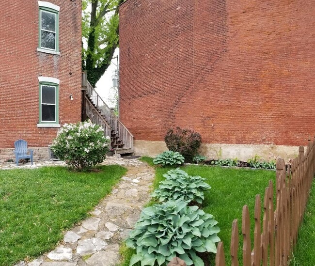 garden fenced in yard - 1916 S 10th St Unit 2nd Floor