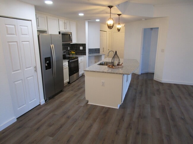 Kitchen to Entry & Primary - 410 S Villa San Marco Dr Unit 201