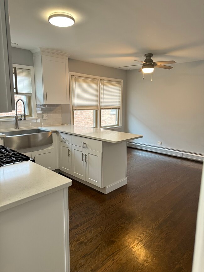 Building Photo - 8222 Grand Ave Unit 3a