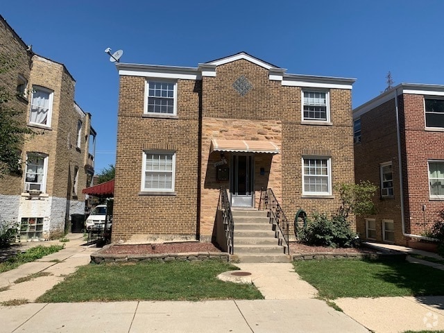 Building Photo - 4912 W Eddy St Unit 2W Rental