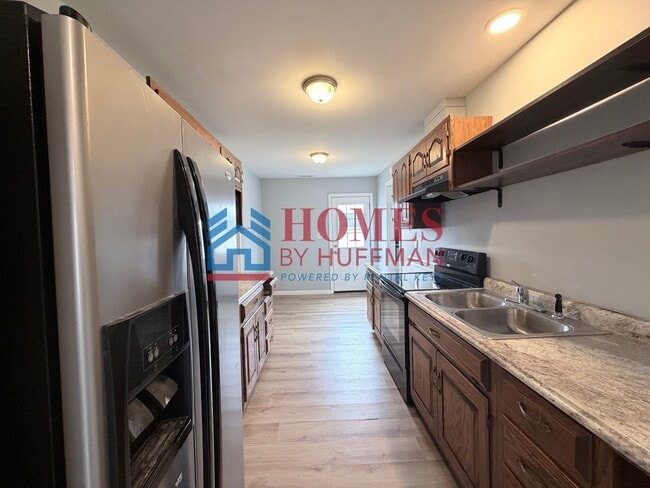 Photo - Three Bedroom House | Now Available