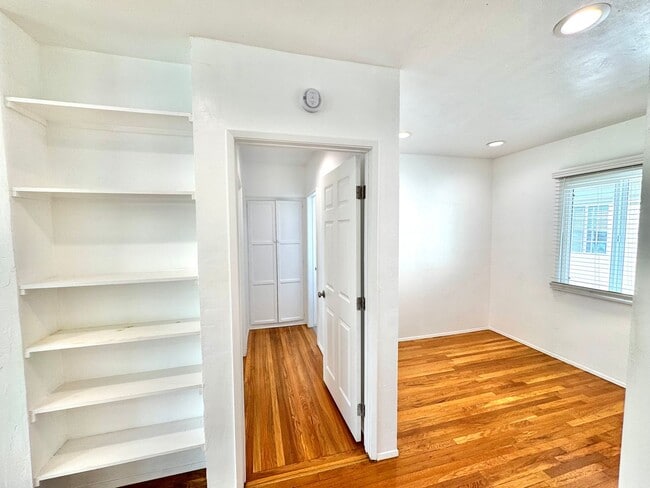 Photo - An apartment with character! Hardwood floors, built-ins - TOP FLOOR - 1 Bed / 1 Bath! Unit 4422