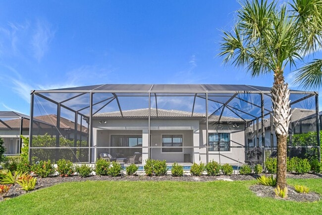 Photo - Luxury Turnkey 3BR + Den / 3BA Pool Home in Greyhawk at Golf Club of the Everglades