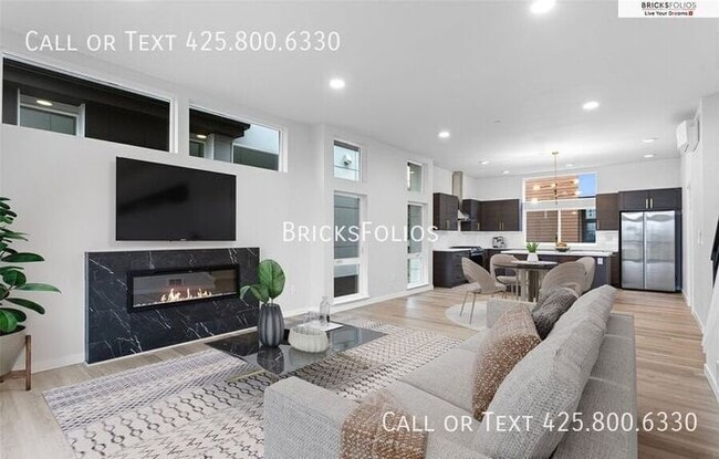 Building Photo - Move-In Ready Townhome with Ground Floor Suite & Views of Olympic Mountains