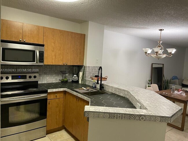 Photo - 8750 N Sherman Cir Unit 208