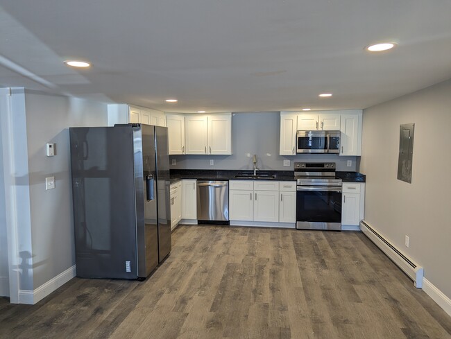 Modern Kitchen with Granite Countertops - 2213 Western Ave Apartments Unit A