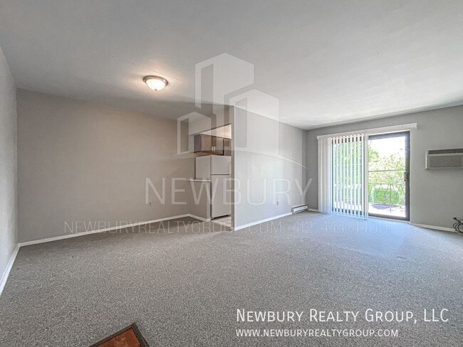 Building Photo - 1459 Poplar St Unit Apt. 10