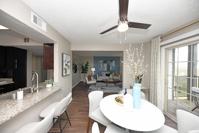Dining area with hardwood-style flooring