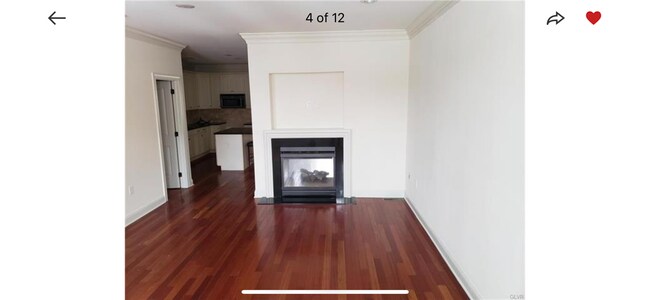 Gas fire place open to both sides with wired TV hook up on top - 805 Evans St