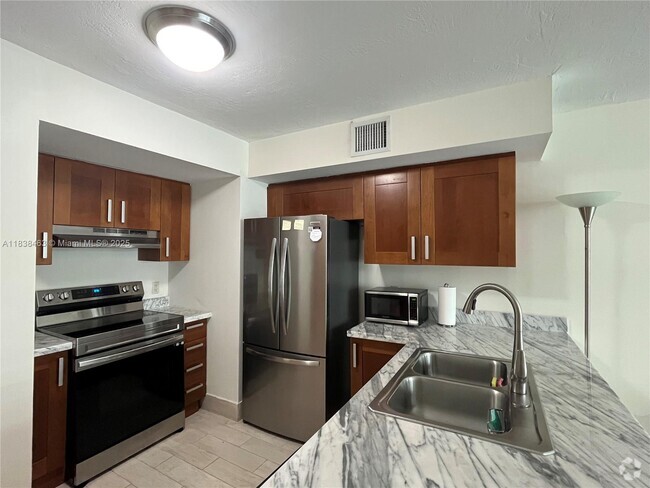 Building Photo - 9499 Collins Ave Unit 307 Rental