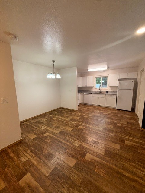 Building Photo - 8111 E 36th Ave Unit B