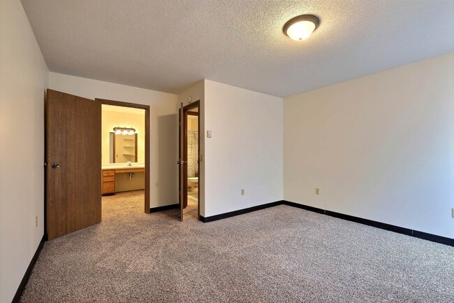 Fargo, ND Prairiewood Meadows | Bedroom - Prairiewood Meadows Rental