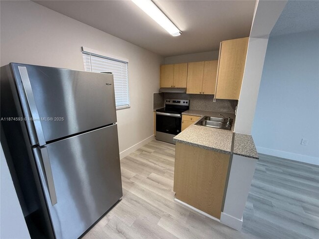 Building Photo - 3626 NE 168th St Unit 404