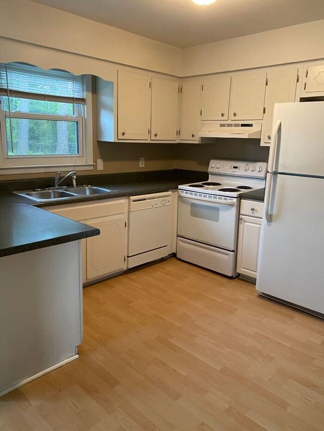 Photo - COMING SOON! 4Br, 2.5 baths, large kitchen, large bedrooms, fence, storage and more! N. College R...