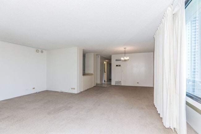 Building Photo - Aloha Towers - 2 bedroom, 2 bath corner unit with 1 covered parking stall