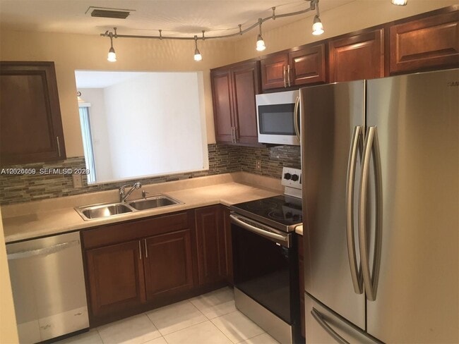 Building Photo - 2551 NW 56th Ave Unit 1-20