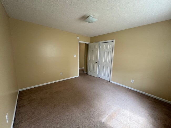 Photo - Charming two bedroom two bath town home that is set on an end unit. This home is just minutes fro...