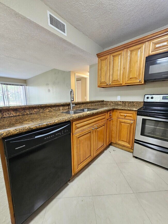 Photo - 1440 Windorah Way Unidad C