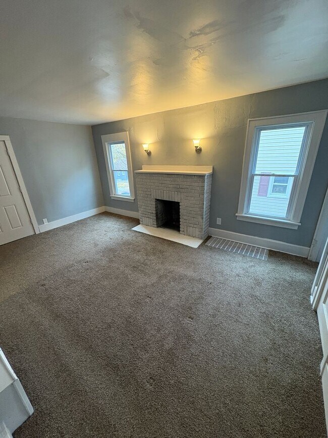 Photo - Spacious 4-Bedroom Akron Home with Garage | Open House Feb 5