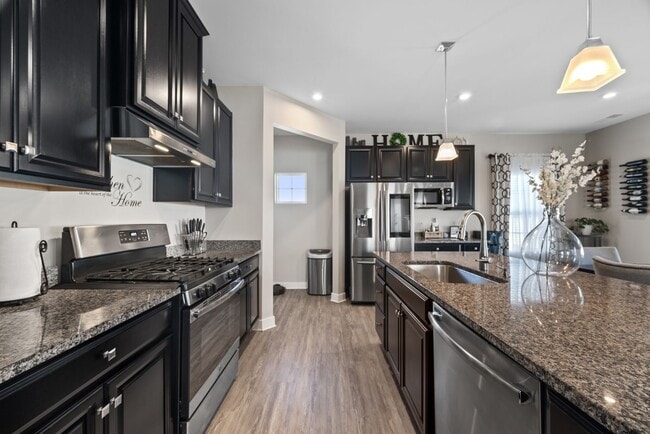 Photo - Charming two-story, 4-bedroom, 3-bathroom home.