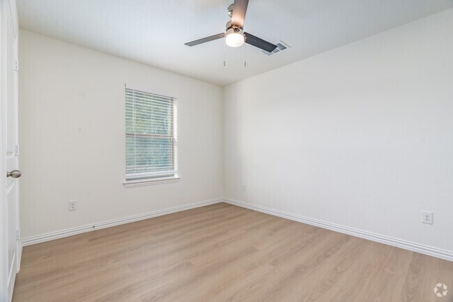 3BR, 2BA - 1,100SF - Primary Bedroom