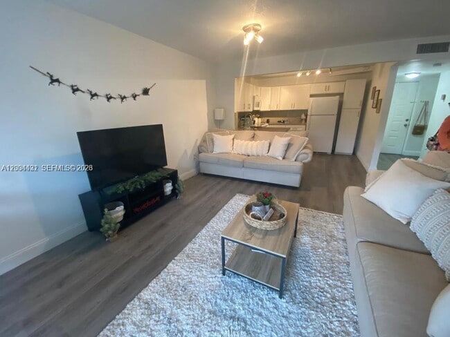 Photo - 721 N Pine Island Rd Unit 209