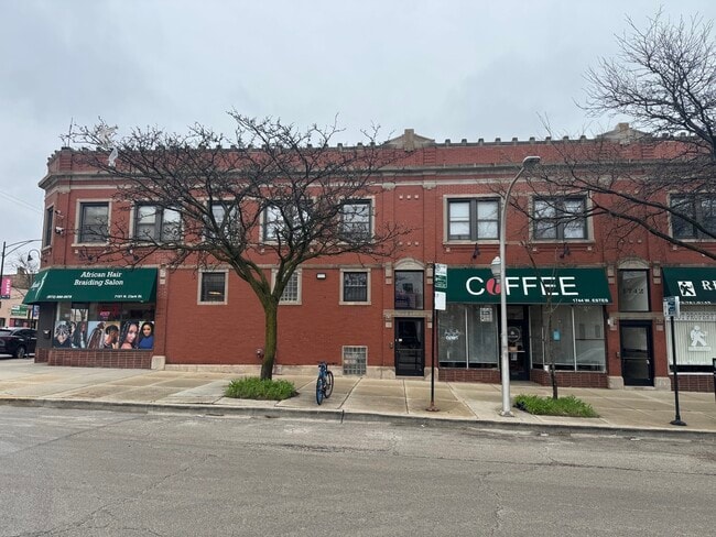 Building Photo - 1746 W Estes Ave Unit 205