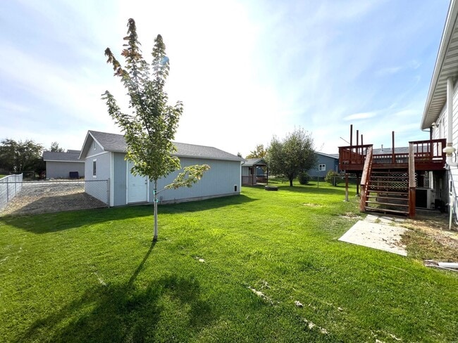 Photo - Pet Friendly 4 Bed 2 Bath Single Family Home W/ Fully Fenced Yard, Double Car Garage Located in E...