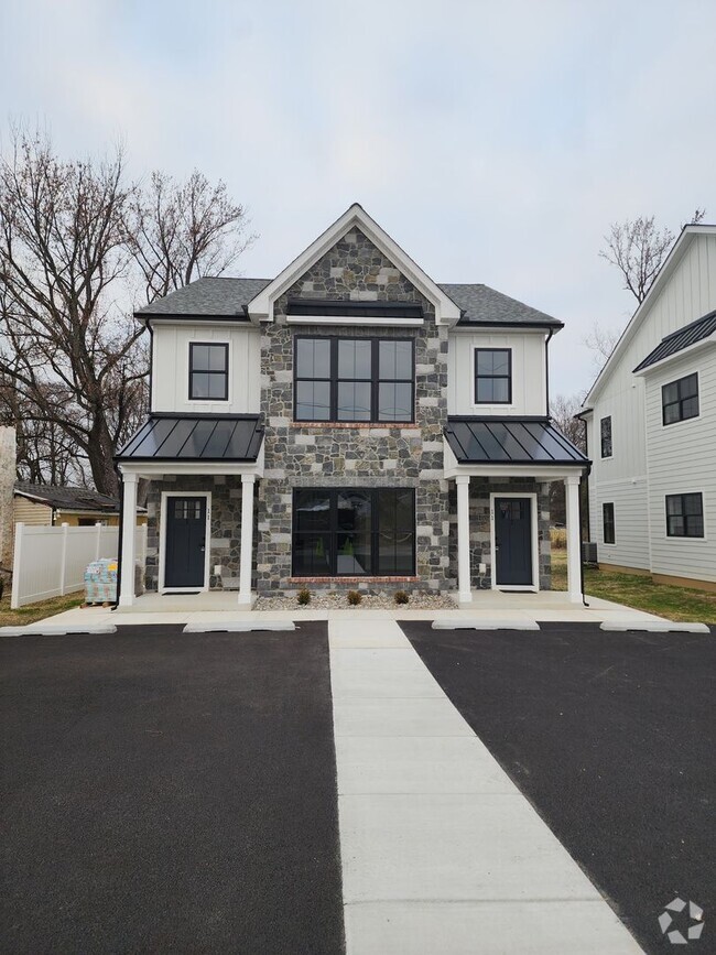 Building Photo - Modern Living: New Construction Rental in ...