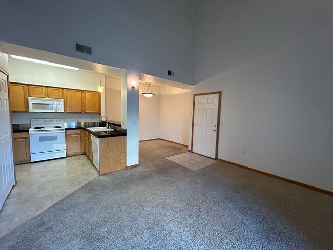 Photo - Bright 2-Bed Condo with Vaulted Ceilings, Garage & Balcony