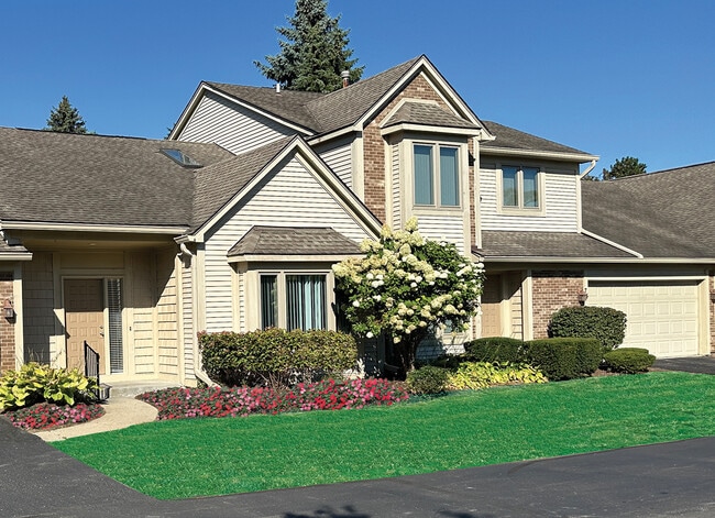 Super luxe privacy-loving townhomes with private patios, 2-car garages, full basement, high-end features. - Covington Club Luxury Homes