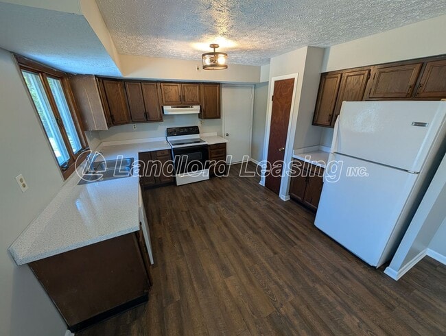 Photo - Spacious 4-Bedroom Home with Scenic Views ...