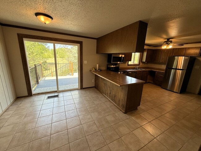 Photo - Charming 4-Bed Retreat on 2.5 Acres with Barn & Garage