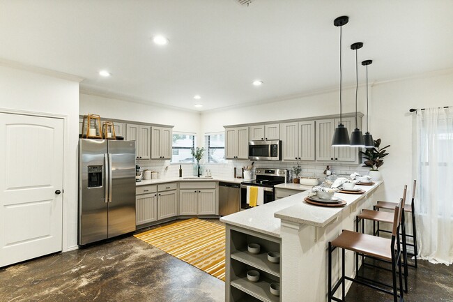 Kitchen Photo - Renovated Unit - The Village on Telluride Apartments