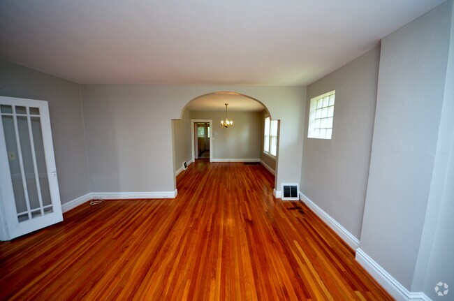 Living room looking into dining room - 6129 W Park Ave Rental