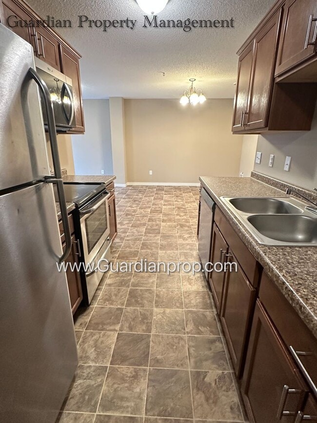 Photo - North Brooklyn Park Town Homes, Dedicated Office, 2 Car Garage, Washer/Dryer, Front Patio