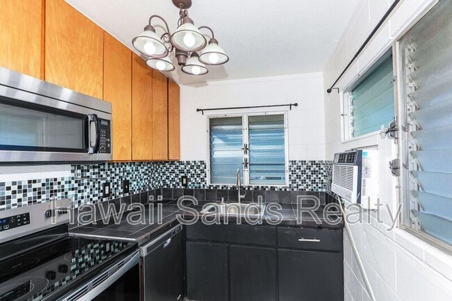 Building Photo - 3331 Hayden St Unit 3331-C Hayden St.