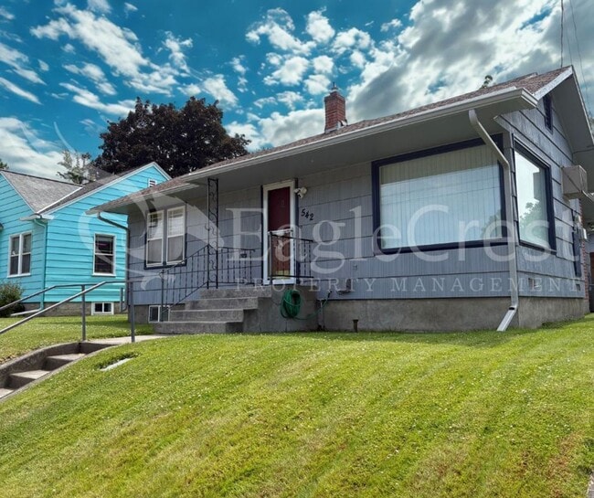 Photo - Three Bedroom, Two Bathroom House with Fenced Yard and Outdoor Fireplace