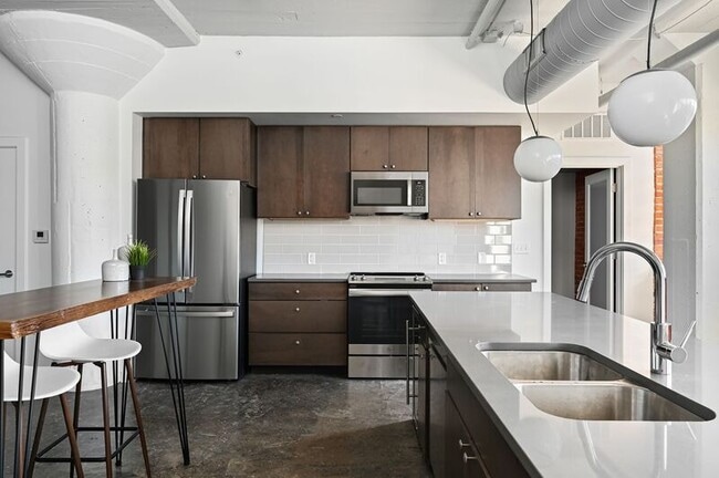 Building Photo - 3829 Main St Unit 601