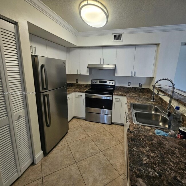 12124 St.Andrews Pl Unit 107